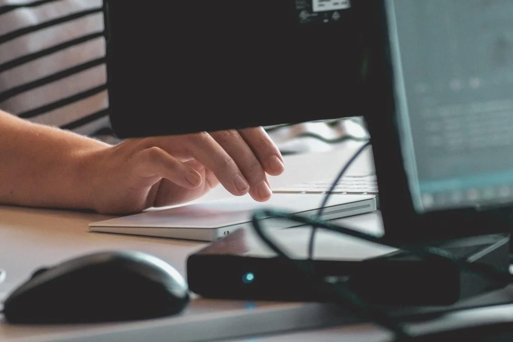 A person using a touchpad