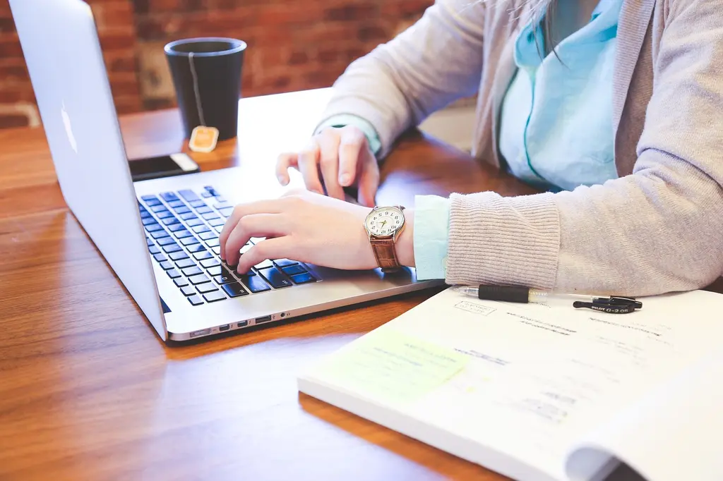 A woman doing email outreach
