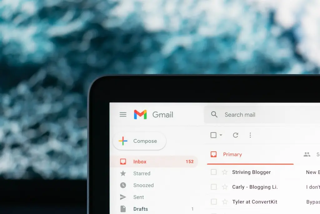 A laptop with Gmail inbox