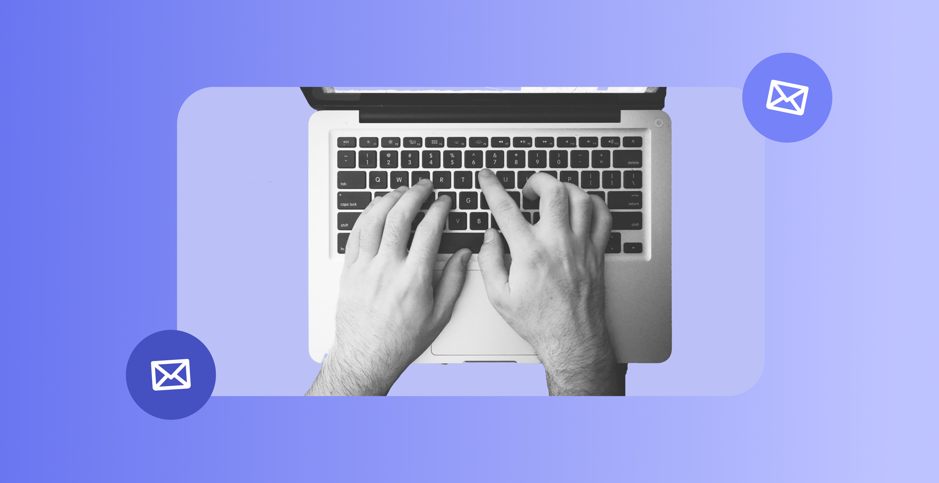 Man typing on laptop.